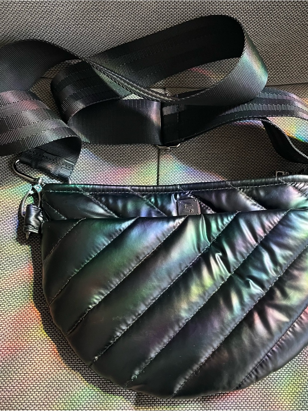 THINK ROYLN Iridescent Black Quilted Crescent Crossbody with Wide Strap
